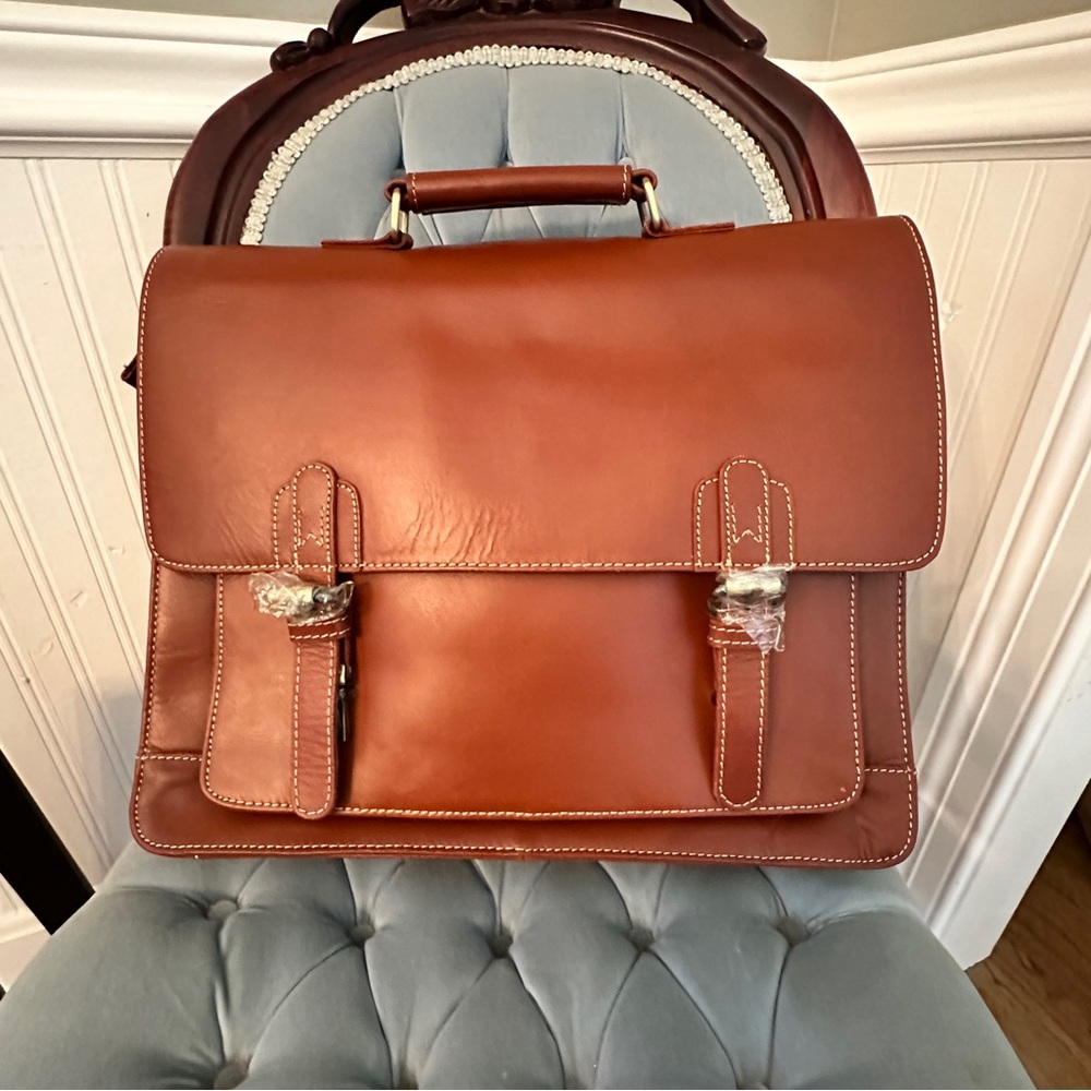 The Real Leather Company NWOT briefcase bag with gold hardware. Brown leather